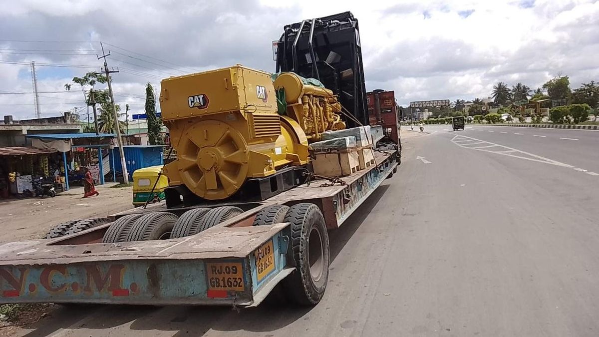 CAT generator set on lowbed trailer