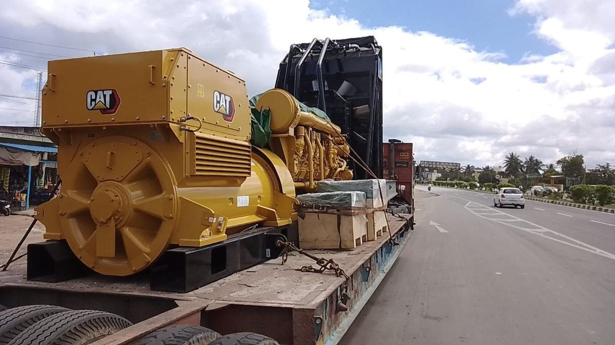 CAT generator set moved on a lowbed trailer