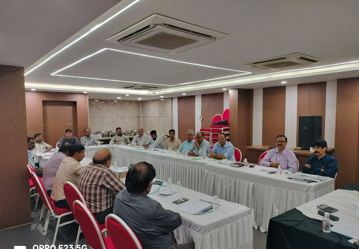 URL Safe Express branch heads in review meeting